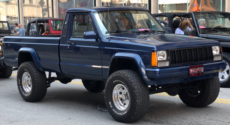 This clean Comanche was participating in the 2018 Toledo Jeep Fest parade. Note the 8-slot grille, shared with the early XJ Cherokees but something Chrysler eventually “corrected” to standardize on 7-slot grilles.